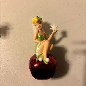 Tinker Bell Figurine on Red Apple
